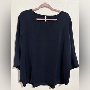 Women’s polyester navy blouse with flutter sleeves